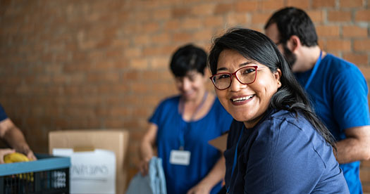Non-profit volunteers working together on a project.