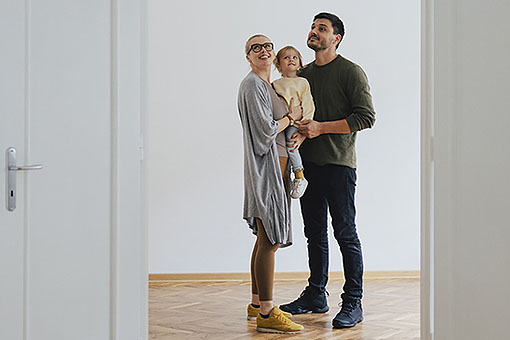 Excited Family Moving In New Home