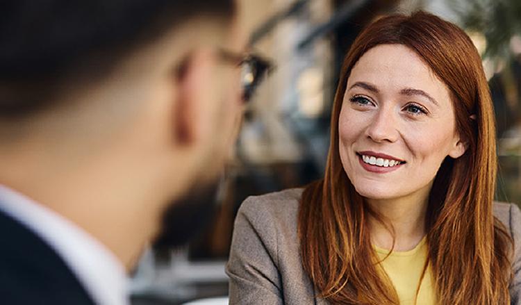 Two people discussing